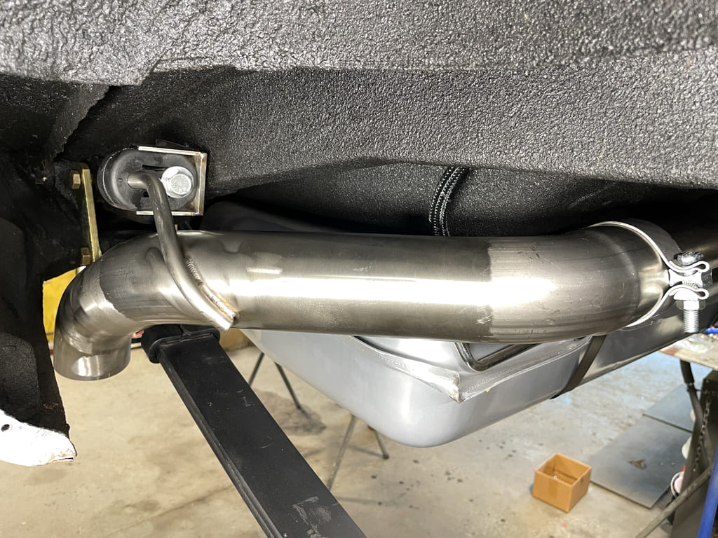 030 Here you can see the completed tailpipe installation along with the support brackets and isolators in place