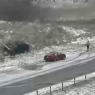 Minnesota Drivers Slip And Slide During Spring Snowstorm