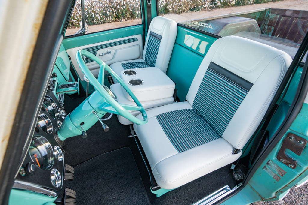 07 Inside view of a 1968 Chevrolet C10 teal and white upholstery