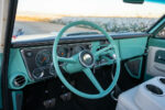 06 Interior of 1968 Chevy C10 teal dashboard white steering wheel