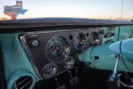 08 Dashboard of 1968 Chevrolet C10 gauges close up teal
