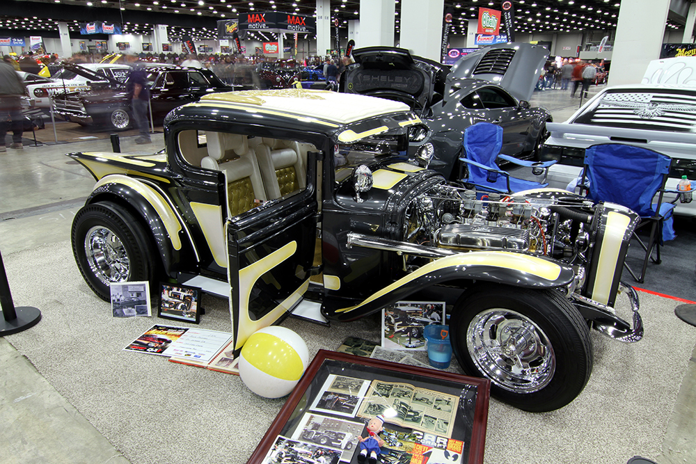 22 yellow and black 1931 ford coupe on display at the detroit autorama
