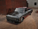02 Custom carbon 1967 Chevrolet C10 truck at an industrial site
