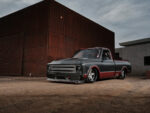 05 Three quarter front view of a modified 1967 Chevy C10 with a carbon body