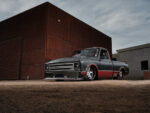 04 Custom 1967 Chevrolet C10 showcasing its lowered stance and red accents