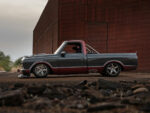 10 Low angle side view of the custom 1967 Chevrolet C10 on a dirt ground