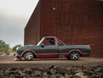 11 Custom 1967 Chevrolet C10 in profile showcasing its carbon finish and red trim
