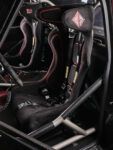 15 Racing seats with harnesses in the carbon fiber interior of a 1967 Chevy C10