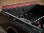 20 Detailed view of the carbon fiber truck bed and red trim in a custom 1967 Chevy C10