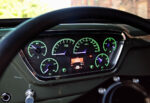 13 Modernized dashboard gauges in a 1954 Ford F100 illuminated