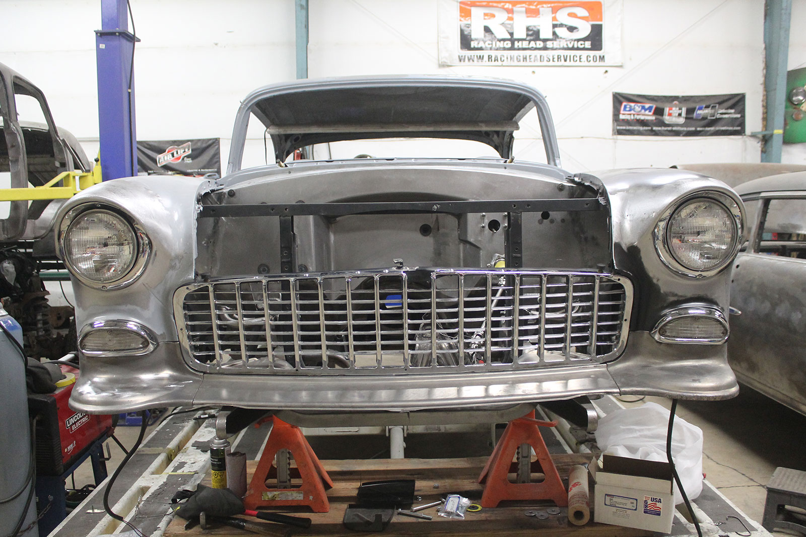 25 Test fitting the front splash aprons parking lights and grille on the vintage car with aligned fenders
