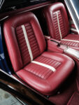 21 Relicate maroon leather seats with white stripe in a 1967 Corvette